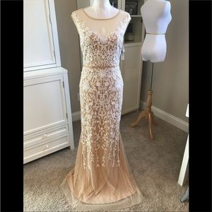 beaded wedding gown new with out tags took off to clean priced to sell asap